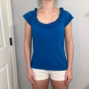 Blue ruffled front top